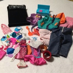 Doll clothes and accessories. Includes small doll bed w/pillow large small dolls